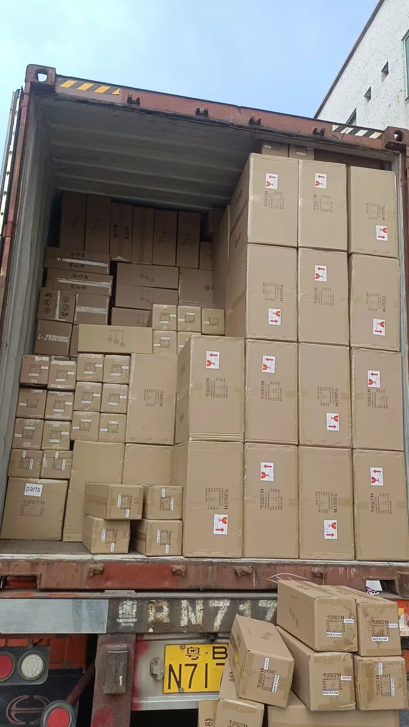 A container truck loaded to the door, ready to leave the yard